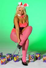  Beautiful blonde Cherry provides an easter treat in her pink bunny outfit. 