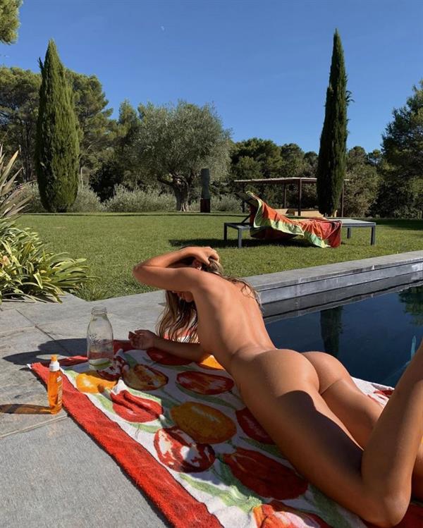 Mathilde Tantot naked new photos while tanning next to her pool in backyard showing off her topless big tits and perfect nude ass.
