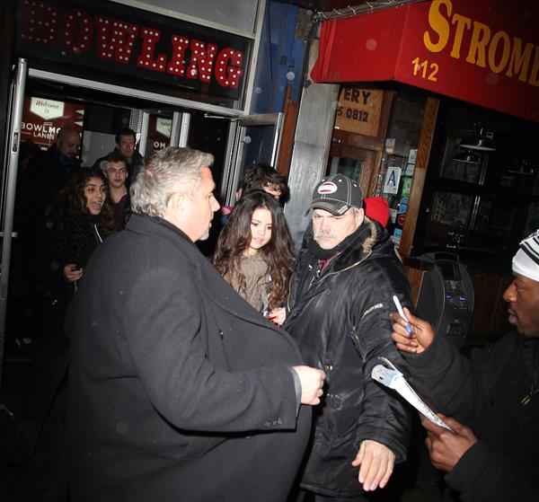 Selena Gomez surrounded by fans for autographs in New York City on February 5, 2013