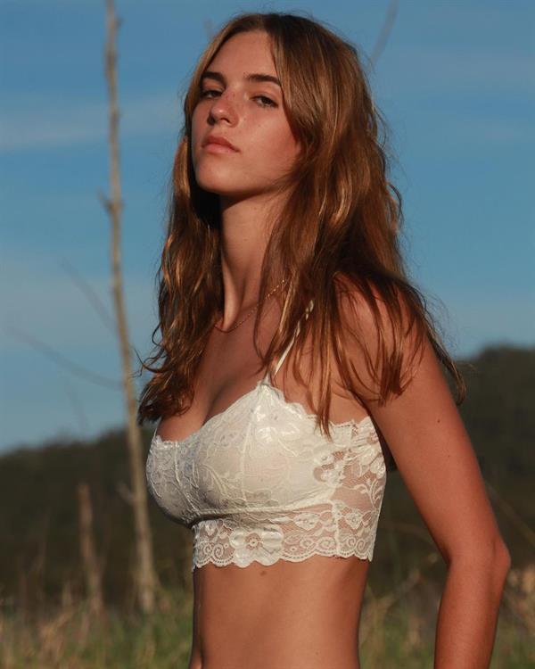Emily Feld white bra