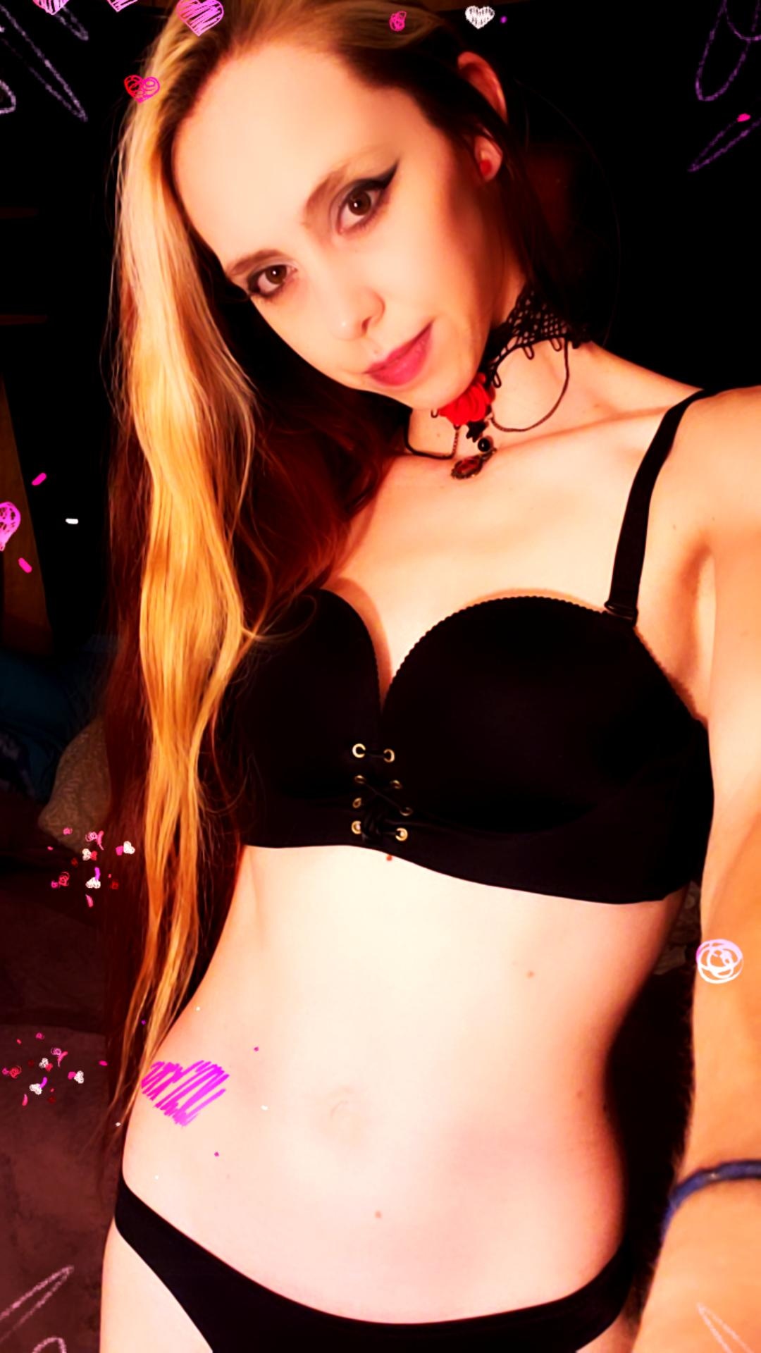 Freais in a bikini taking a selfie