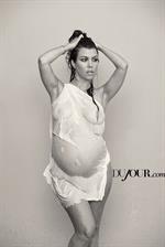 Kourtney Kardashian - breasts