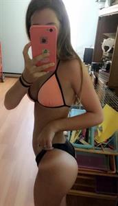 Katherine Fox in a bikini taking a selfie
