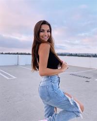 Sexy Ripped Jeans and Black Halter Top