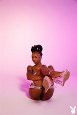 Sabrea Phenix flirty ebony in the studio for Playboy