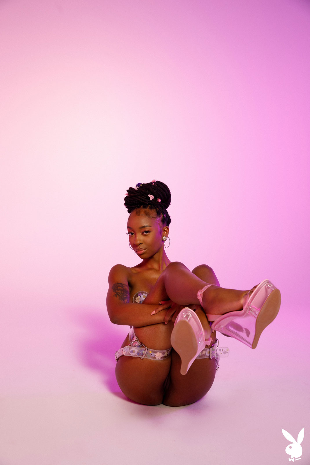 Sabrea Phenix flirty ebony in the studio for Playboy