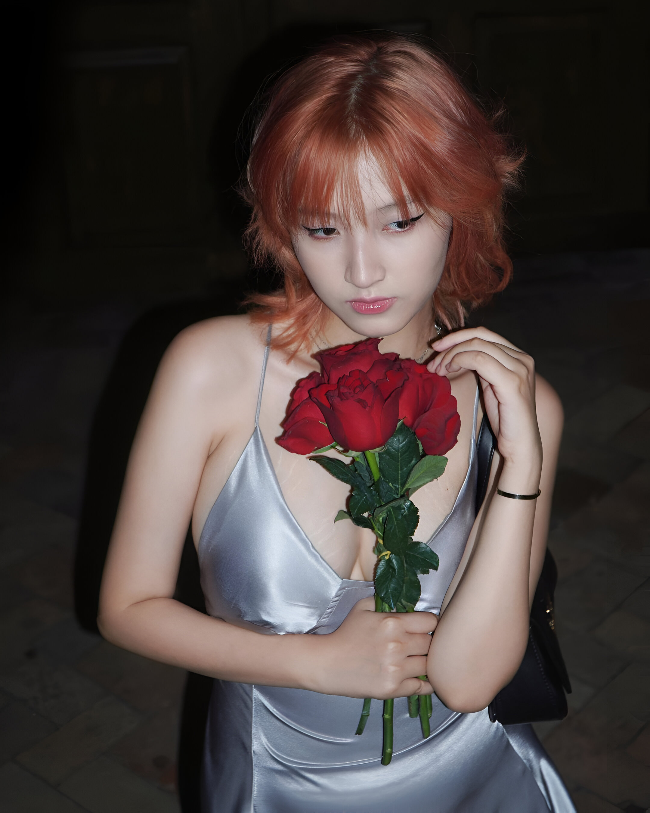 Spilling out of dress