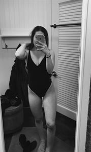 Cortney in a bikini taking a selfie