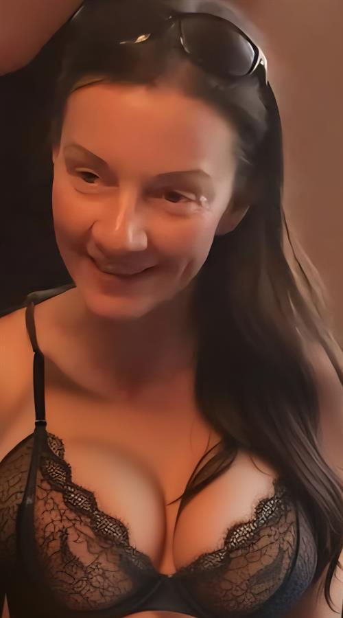 Beth Helpfert in lingerie taking a selfie