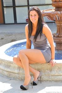 Harper in her micro dress spreading