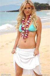 Lia 19 plays on a sandy beach