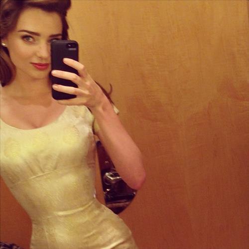 Miranda Kerr taking a selfie