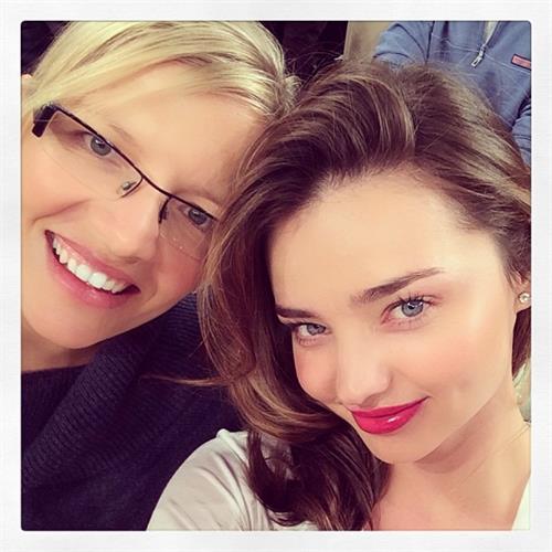 Miranda Kerr taking a selfie