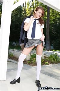 Firery redheaded school girl strips outdoors