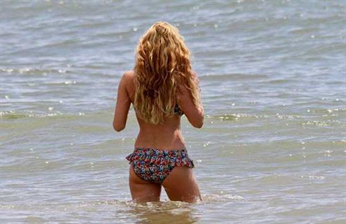 Kelly Brook in a bikini - ass