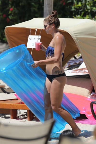 Alex Morgan and Sydney Leroux in bikinis on the beach in Hawaii