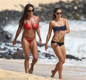 Alex Morgan and Sydney Leroux in bikinis on the beach in Hawaii