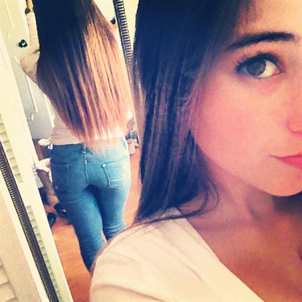 Angie Varona taking a selfie and - ass