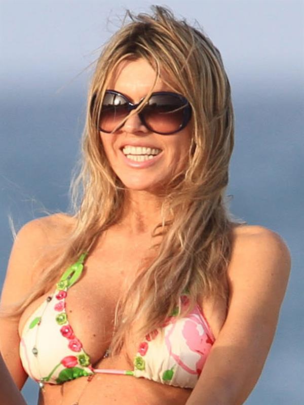Rita Rusic in a bikini on the beach